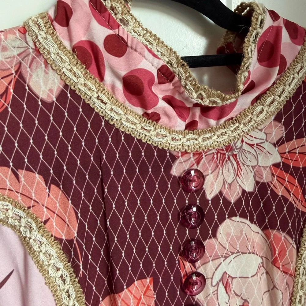 It’s giving Zimmerman without the price tag! Pink and burgundy floral dress sm.